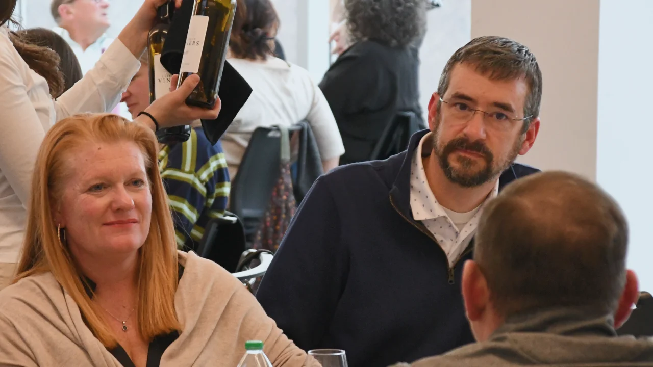 Chemistry of Wine participants conversing about wine aromas